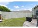 Artificial grass and privacy fence, with patio and outdoor furniture at 418 Thaxton Ln, Woodstock, GA 30188