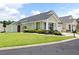 Charming home with well-maintained lawn and landscaping, attached garage, and inviting entrance at 418 Thaxton Ln, Woodstock, GA 30188
