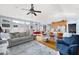 Spacious living area with a cozy sitting space that includes hardwood floors, and lots of natural light at 418 Thaxton Ln, Woodstock, GA 30188