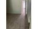 Spacious carpeted bedroom with a glimpse of the hallway at 4525 N Landing Dr, Marietta, GA 30066