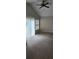 Bright bedroom with large windows and sliding glass door to back, new carpet, and neutral paint at 4525 N Landing Dr, Marietta, GA 30066
