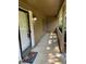 Inviting covered front porch with welcome mat and exterior light fixture at 4525 N Landing Dr, Marietta, GA 30066