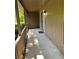 Covered front porch featuring neutral tones and an outdoor light fixture at 4525 N Landing Dr, Marietta, GA 30066