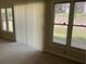 Bright living room with large window and vertical blinds allowing natural light in at 4525 N Landing Dr, Marietta, GA 30066