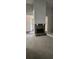 Spacious living room featuring a stone fireplace, neutral paint, and new carpet at 4525 N Landing Dr, Marietta, GA 30066