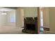 Spacious living room with a stone fireplace, neutral carpet, and views to other rooms at 4525 N Landing Dr, Marietta, GA 30066