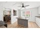 Modern kitchen featuring a center island, stainless steel appliances, and sleek cabinets at 936 Tyrell Dr, Austell, GA 30106