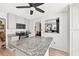 Well-lit kitchen with an island featuring granite countertops and stainless steel appliances at 936 Tyrell Dr, Austell, GA 30106
