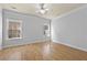 Bedroom with neutral walls and hardwood flooring at 120 Daniel Creek Ln, Sugar Hill, GA 30518