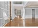 Inviting foyer with hardwood floors, showcasing the staircase and open layout at 120 Daniel Creek Ln, Sugar Hill, GA 30518
