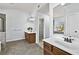 Spacious main bathroom featuring dual sinks, walk-in shower and large tub at 120 Daniel Creek Ln, Sugar Hill, GA 30518