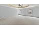 Large primary bedroom with a decorative tray ceiling and lots of natural light at 120 Daniel Creek Ln, Sugar Hill, GA 30518