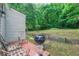 Backyard featuring a charcoal grill on a brick patio at 1279 Skyhaven Se Rd, Atlanta, GA 30316