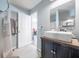 Modern bathroom featuring a ceramic vessel sink and a door to another room at 1279 Skyhaven Se Rd, Atlanta, GA 30316
