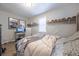 Bedroom featuring decor, light hardwood floors, natural light, and decorated shelves at 1279 Skyhaven Se Rd, Atlanta, GA 30316