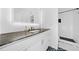 Modern bathroom with gray countertop vanity and walk-in shower at 52 Chaumont Nw Sq, Atlanta, GA 30327