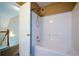 Bright white bathroom featuring a shower and a white door at 55 Legend Creek Cv, Douglasville, GA 30134