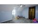 Spacious bedroom with neutral walls, plush carpeting, and a window with dark curtains at 55 Legend Creek Cv, Douglasville, GA 30134