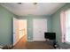 Cozy bedroom featuring neutral walls, carpet flooring, and a double door closet at 55 Legend Creek Cv, Douglasville, GA 30134