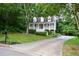 Charming home with a welcoming front porch and landscaped front yard at 55 Legend Creek Cv, Douglasville, GA 30134