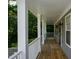 View of the porch with railings and a view of the front yard at 55 Legend Creek Cv, Douglasville, GA 30134