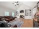 Spacious living room features a fireplace, built-in shelving, and abundant natural light at 7532 Milford Pl, Douglasville, GA 30135