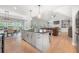 Spacious open floor plan connecting the kitchen, dining area, and living room at 7532 Milford Pl, Douglasville, GA 30135