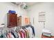 Walk-in closet featuring ample hanging space, shelving, and room for storage at 233 Hampton Station Blvd, Canton, GA 30115