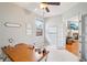 Cozy office area featuring a wooden desk and a view into the house that provides a bright and efficient work area at 233 Hampton Station Blvd, Canton, GA 30115