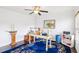Bright office space featuring a ceiling fan, hardwood floors, and ample natural light at 233 Hampton Station Blvd, Canton, GA 30115