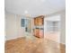 Finished basement with tile flooring, cabinetry, and large openings to other rooms for easy access at 358 Woodbrook Crst, Canton, GA 30114
