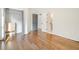 Bright bedroom boasts hardwood floors and an open closet, providing ample storage space at 358 Woodbrook Crst, Canton, GA 30114