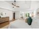 Airy primary bedroom features decor, dresser, wood floors, seating, and large bed at 358 Woodbrook Crst, Canton, GA 30114
