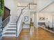 Grand foyer with hardwood floors, staircase, and open layout at 358 Woodbrook Crst, Canton, GA 30114