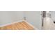 Hallway view showing hardwood floors and leading to a closet area at 358 Woodbrook Crst, Canton, GA 30114