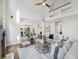 Bright living area with fireplace and soaring ceilings leading to a second-story overlook at 358 Woodbrook Crst, Canton, GA 30114