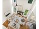 Sunlit living room featuring a cozy seating area, fireplace, and hardwood floors at 358 Woodbrook Crst, Canton, GA 30114