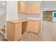 A functional mudroom boasts ample cabinet storage and countertop space, offering convenience and organization to the home at 358 Woodbrook Crst, Canton, GA 30114
