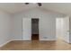 Bright main bedroom features vaulted ceiling, wood-look flooring, and ensuite bath and walk-in closet at 3614 Spring Leaf Ln, Acworth, GA 30101