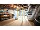 Spacious unfinished basement with exposed ceiling and utility connections at 1035 Cornish Mountain Church Rd, Oxford, GA 30054