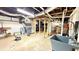 Spacious unfinished basement with exposed ceiling and utility connections at 1035 Cornish Mountain Church Rd, Oxford, GA 30054