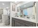 Bright bathroom featuring a dual sink vanity, walk-in shower, and modern fixtures at 1035 Cornish Mountain Church Rd, Oxford, GA 30054