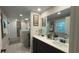 Bright bathroom featuring a dual sink vanity, walk-in shower, and modern fixtures at 1035 Cornish Mountain Church Rd, Oxford, GA 30054