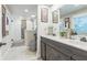 Bright bathroom featuring a dual sink vanity, walk-in shower, and modern fixtures at 1035 Cornish Mountain Church Rd, Oxford, GA 30054