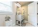 Well-lit bathroom boasts a modern vanity, updated fixtures, and a bright, clean design at 1035 Cornish Mountain Church Rd, Oxford, GA 30054