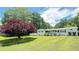 Charming one-story brick home with a spacious front yard and inviting covered porch at 1035 Cornish Mountain Church Rd, Oxford, GA 30054