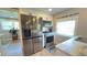 Well-lit kitchen with stainless steel appliances, marble countertops, and updated features at 1035 Cornish Mountain Church Rd, Oxford, GA 30054