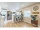 Well-lit kitchen with stainless steel appliances, modern countertops, and inviting seating area at 1035 Cornish Mountain Church Rd, Oxford, GA 30054
