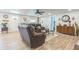 Inviting living room boasts hardwood floors, ample natural light, and a cozy seating arrangement at 1035 Cornish Mountain Church Rd, Oxford, GA 30054