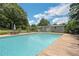 A large in-ground pool with ample decking and seating areas, perfect for summer relaxation at 1035 Cornish Mountain Church Rd, Oxford, GA 30054